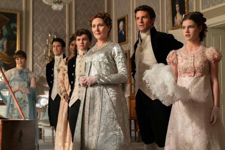 (From left) Claudia Jessie as Eloise Bridgerton, Luke Thompson as Benedict Bridgerton, Simone Ashley as Kate Sharma, Will Tilston as Gregory Bridgerton, Ruth Gemmell as Lady Violet Bridgerton, Jonathan Bailey as Anthony Bridgerton, Florence Hunt as Hyacinth Bridgerton. Liam Daniel/Netflix