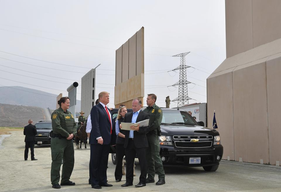 President Donald Trump inspects border wall prototypes in San Diego on March 13.&nbsp; (Photo: MANDEL NGAN/AFP via Getty Images)