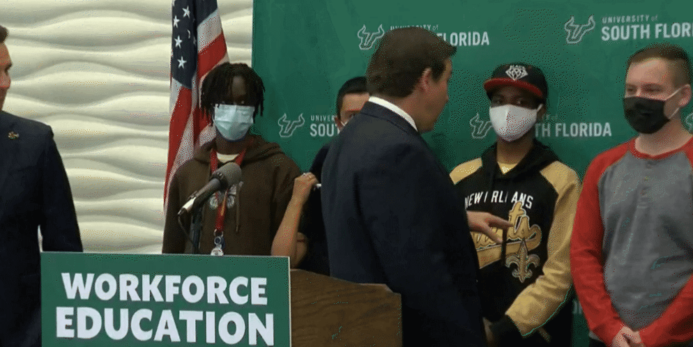 Florida Gov. Ron DeSantis scolds students for wearing face masks during his visit to University of South Florida. (WFLA)