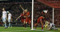 Liverpool's Martin Skrtel (C) celebrates after his team scored during their English Premier League soccer match against West Ham United at Anfield in Liverpool,, northern England December 7, 2013. REUTERS/Phil Noble