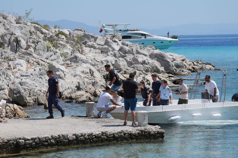 Emergency services on a boat at Agia Marina in Symi, Greece, where a body has been discovered