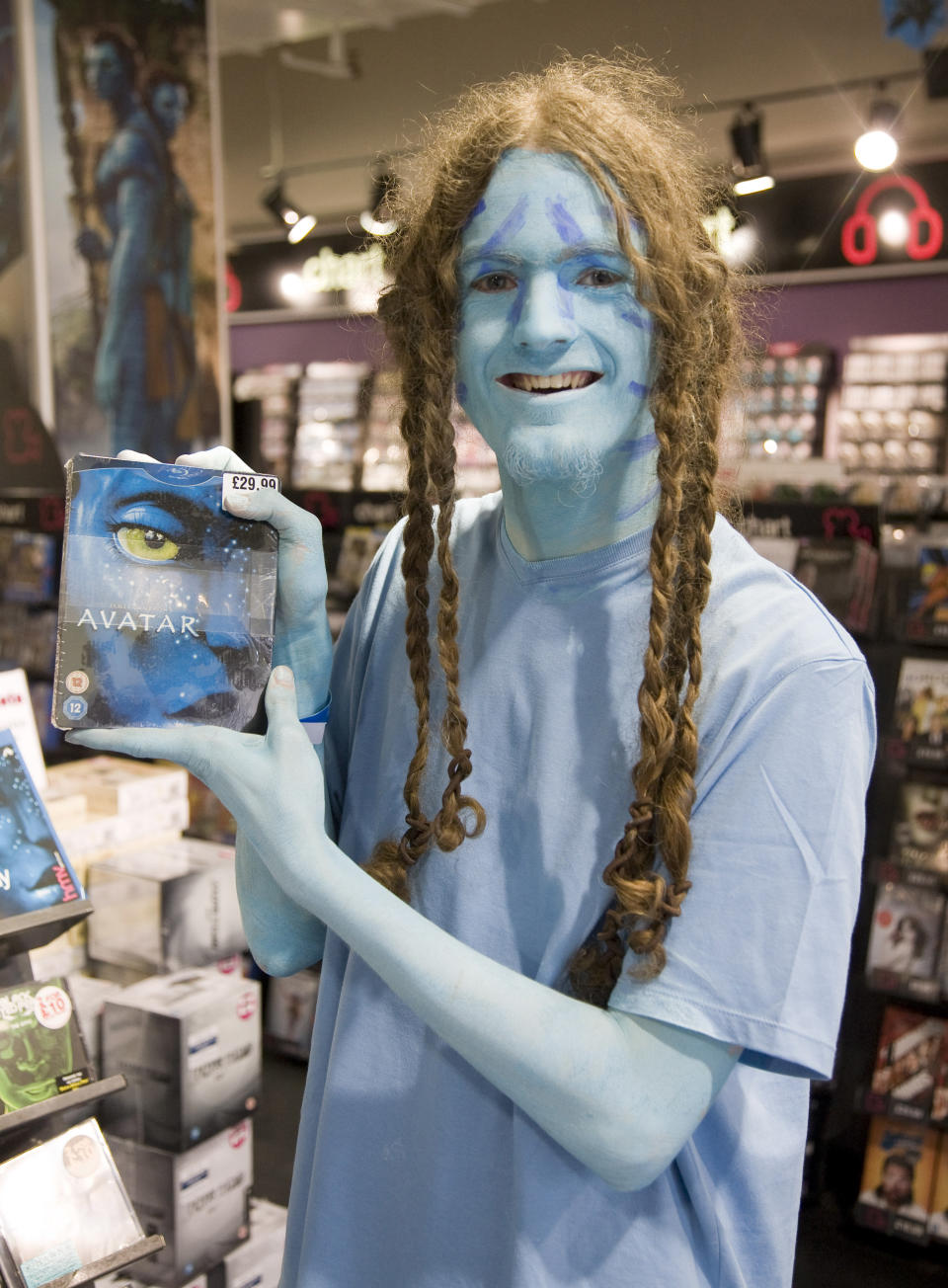 A Fan Picks Up His Copy Of Avatar On Dvd On Sale In Hmv On Oxford Circus In Central London. (Photo by John Phillips/UK Press via Getty Images)