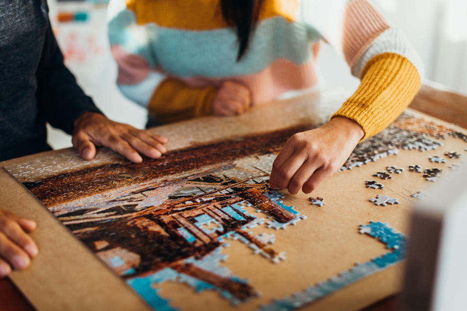 Jigsaw puzzles allow you to see the progress you're making.  (Photo: LOUISE BEAUMONT via Getty Images)