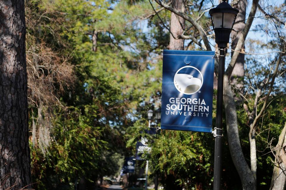 Georgia Southern flags hang from light poles on the Armstrong campus.