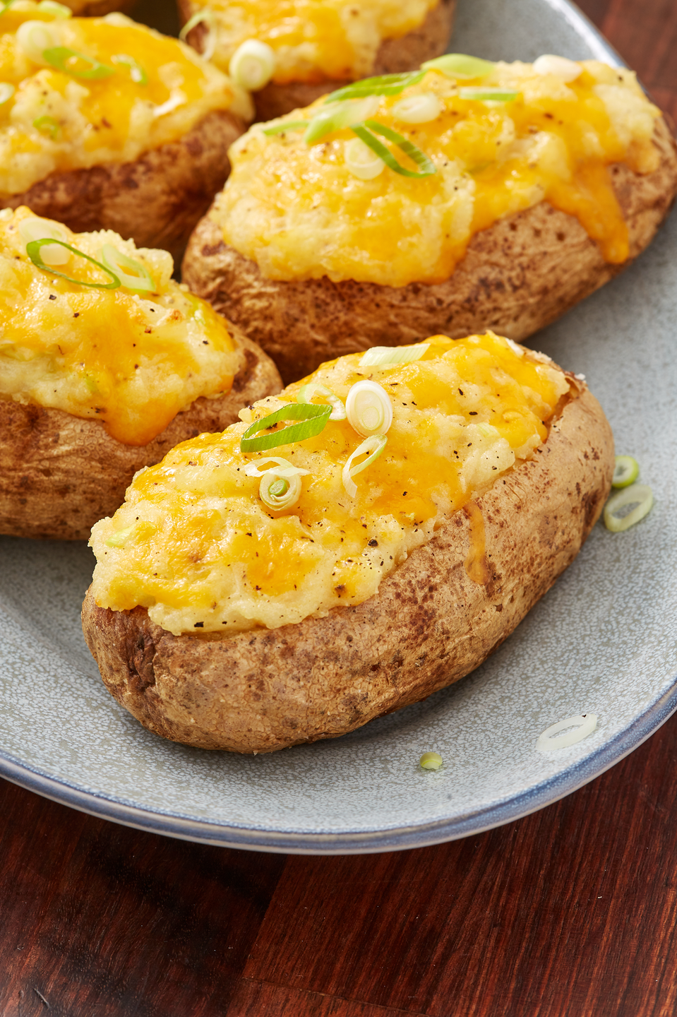 <p>Twice-baked potatoes are basically a way to eat <a href="https://www.delish.com/cooking/recipe-ideas/recipes/a50630/perfect-mashed-potatoes-recipe/" rel="nofollow noopener" target="_blank" data-ylk="slk:mashed potatoes;elm:context_link;itc:0;sec:content-canvas" class="link ">mashed potatoes</a> in a cute little potato boat. It's the most decadent <a href="https://www.delish.com/cooking/recipe-ideas/a22553662/how-to-bake-a-potato-in-the-oven/" rel="nofollow noopener" target="_blank" data-ylk="slk:baked potato;elm:context_link;itc:0;sec:content-canvas" class="link ">baked potato</a>, with the most delicious mashed potato filling.</p><p>Get the <strong><a href="https://www.delish.com/cooking/recipe-ideas/a28437793/twice-baked-potatoes-recipe/" rel="nofollow noopener" target="_blank" data-ylk="slk:Twice-Baked Potatoes recipe;elm:context_link;itc:0;sec:content-canvas" class="link ">Twice-Baked Potatoes recipe</a></strong>.</p>