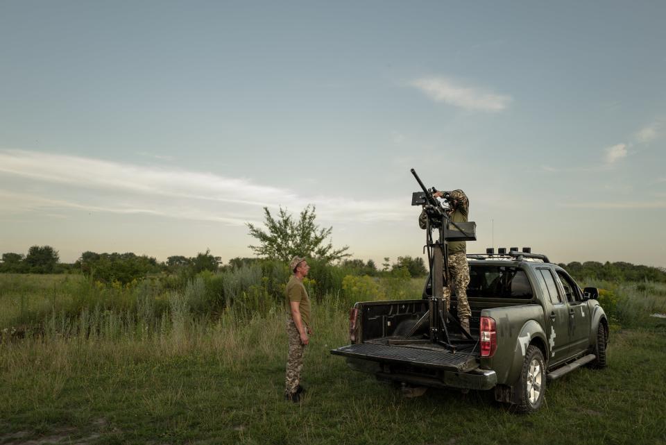 Soldiers from a mobile anti-aircrafts brigade prepare a 12.7mm calibre heavy machine gun near a training field in the Khmelnytsky region (AFP via Getty Images)