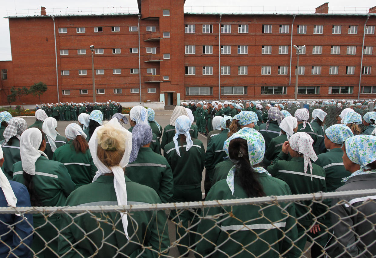 Imprisoned women stand during a morning inspection at a women's prison in Sarapul, central Russia, in 2021. (Yuri Tutov / AP)