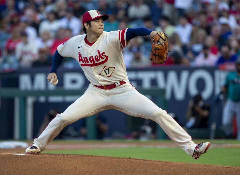 Los Angeles Angels starting pitcher Shohei Ohtani throws to a Seattle Mariners batter during the first inning of a baseball game in Anaheim, Calif., Saturday, Sept. 17, 2022. (AP Photo/Alex Gallardo)