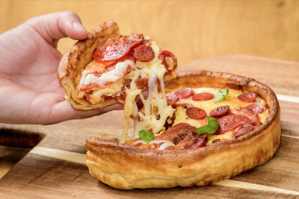 The cheese and batter hybrid combines a Yorkshire pudding base with a tomato sauce and mozzarella filling (PA) 