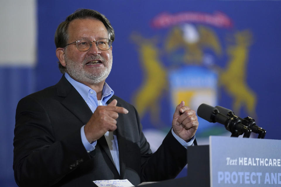 Sen. Gary Peters, D-Mich., speaks during an event with Democratic presidential candidate former Vice President Joe Biden at Beech Woods Recreation Center, in Southfield, Mich., Friday, Oct. 16, 2020. (AP Photo/Carolyn Kaster)