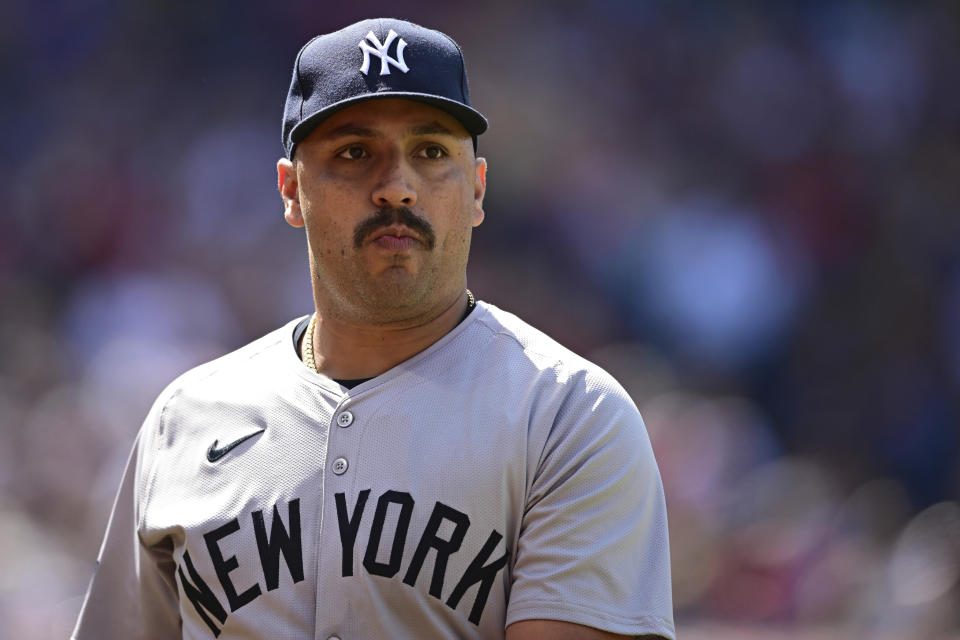 New York Yankees starting pitcher Nestor Cortes walks to the dugout after being removed in the fifth inning of a baseball game against the Cleveland Guardians, Sunday, April 14, 2024, in Cleveland. (AP Photo/David Dermer)