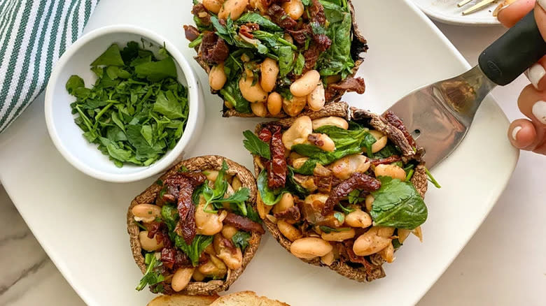 Stuffed portobello mushrooms on serving platter