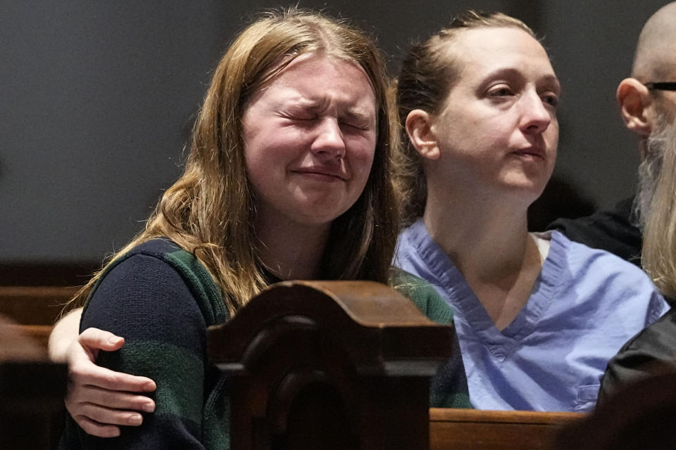 Parishioners participate in a community vigil at Belmont United Methodist Church in the aftermath of a school shooting in Nashville, Monday, March 27, 2023, in Nashville, Tenn. Nashville police identified the victims in the private Christian school shooting Monday as three 9-year-old students and three adults in their 60s, including the head of the school. (AP Photo/John Bazemore)