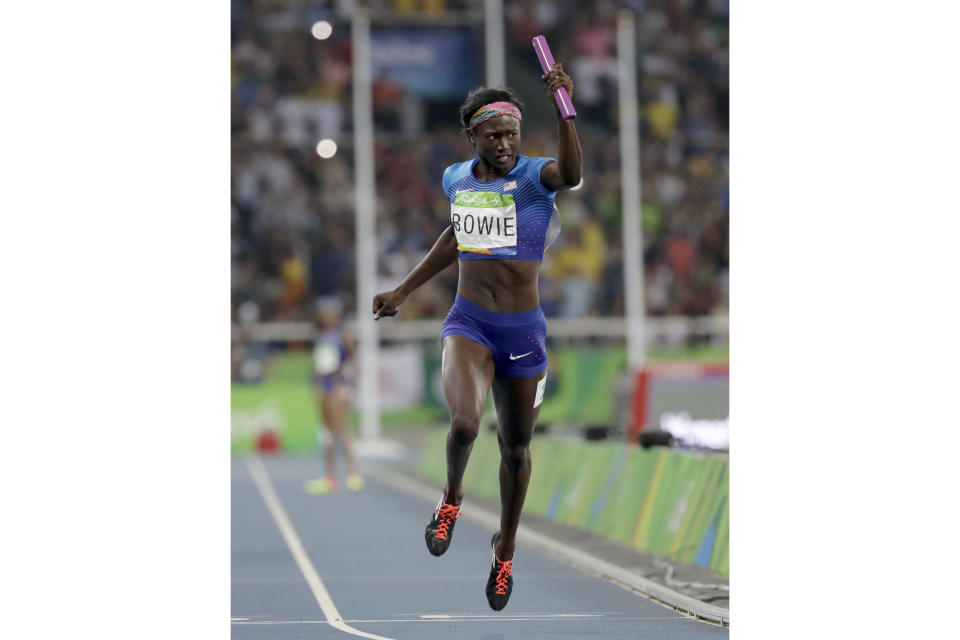 FILE - United States's Tori Bowie crosses the line to win the gold medal in the women's 4x100-meter relay final during the athletics competitions of the 2016 Summer Olympics at the Olympic stadium in Rio de Janeiro, Brazil, Friday, Aug. 19, 2016. Tori Bowie, the sprinter who won three Olympic medals at the 2016 Rio de Janeiro Games, has died, her management company and USA Track and Field said Wednesday, May 3, 2023. Bowie was 32. She was found Tuesday in her Florida home. No cause of death was given. (AP Photo/David J. Phillip, File)