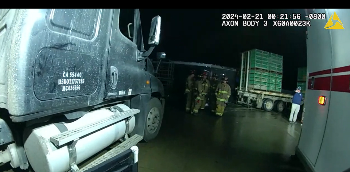 Sanger Police Department body camera footage of first responders arriving at the scene of a workplace fatality at Pitman Family Farms on February 21, 2024. The truck involved in the death is registered to the Pitman-owned poultry transportation fleet Western Grain & Milling Inc.