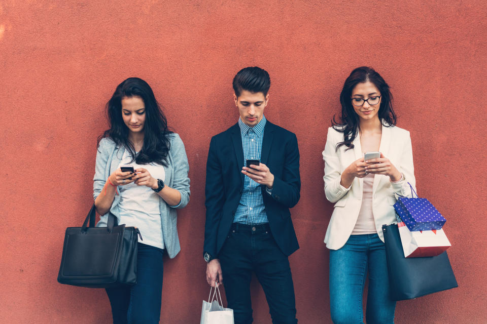 Hunching over our phones is not doing any good for our bodies says movement specialist Matt Waterton. Source: Getty