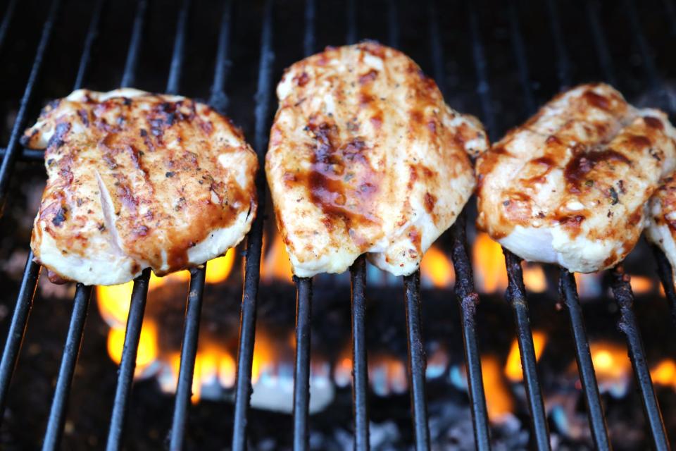 grilled chicken grilling flames