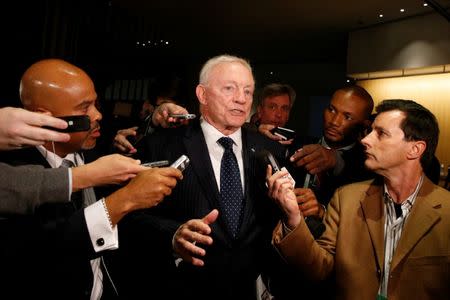 Dallas Cowboys owner Jerry Jones speaks to members of the media as he exits the NFL owners meeting in New York City, U.S. October 17, 2017. REUTERS/Brendan McDermid