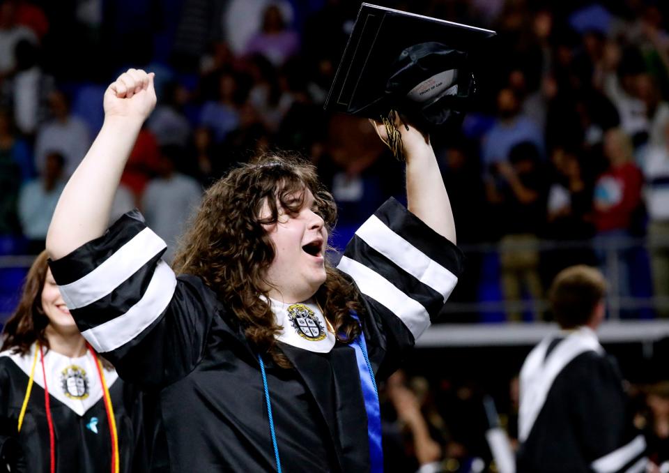 Central Magnet School graduate Matthew Moore celebrates after Central Magnet School’s graduation program as he walks off the floor at MTSU’s Murphy Center on Monday, May 13, 2024.