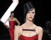 <b>Armani Prive SS13</b><br><br>Chunky embellishments added a dramatic twist to necklines.<br><br>©Reuters