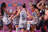 <p>Team USA's Jacquelyn Young, Stefanie Dolson, Kelsey Plum and Allisha Gray embrace as they win gold in the 3x3 Basketball competition at Aomi Urban Sports Park on July 28.</p>