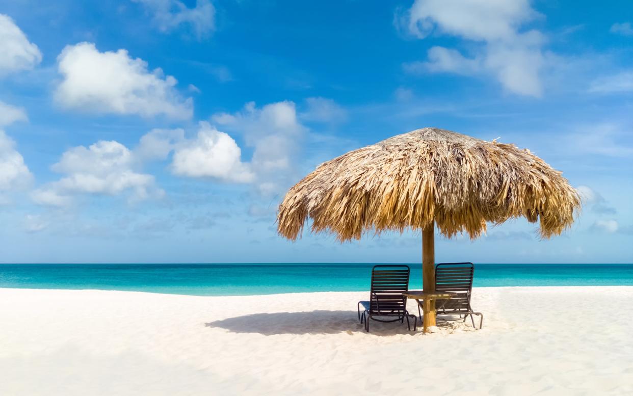 Aruba's beaches have been empty to international tourists since mid March - iStock