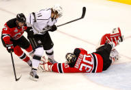 NEWARK, NJ - JUNE 02: Martin Brodeur #30 of the New Jersey Devils makes a save as Anze Kopitar #11 of the Los Angeles Kings and Zach Parise #9 look on during Game Two of the 2012 NHL Stanley Cup Final at the Prudential Center on June 2, 2012 in Newark, New Jersey. (Photo by Paul Bereswill/Getty Images)