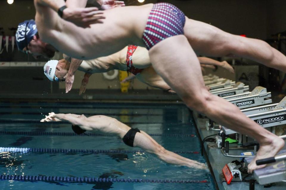 The men’s swimming team at Queens University of Charlotte, photographed during a recent practice, won conference and NIC titles this year, but were not eligible for the NCAA championship meet per transitioning rules.