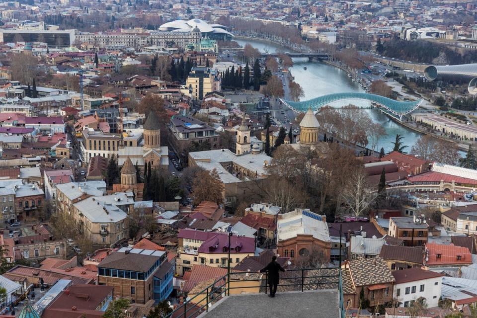 Antropov contemplates the city centre at the viewpoint near Narikala fortress (Reuters)