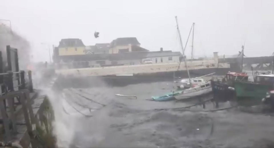 <p>Winds batter the harbor as storm Ophelia hits Cork, Ireland, Oct. 16, 2017, in this still images obtained from social media video. (Photo: Kieron O’Connor via Reuters) </p>