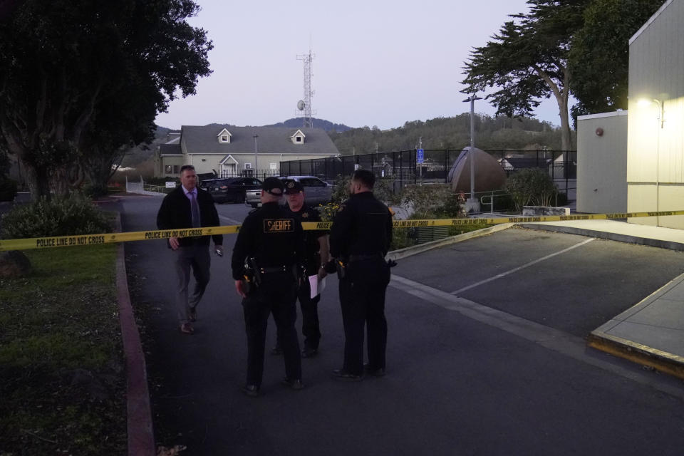 Multiple people were killed in two related shootings Monday at a mushroom farm and a trucking firm in a coastal community south of San Francisco, and officials say a suspect is in custody. (Jeff Chiu / AP)