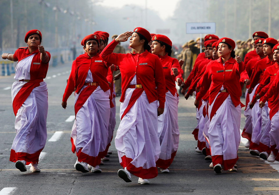 Indian civil defense personnel march during a full-dress rehearsal in Kolkata