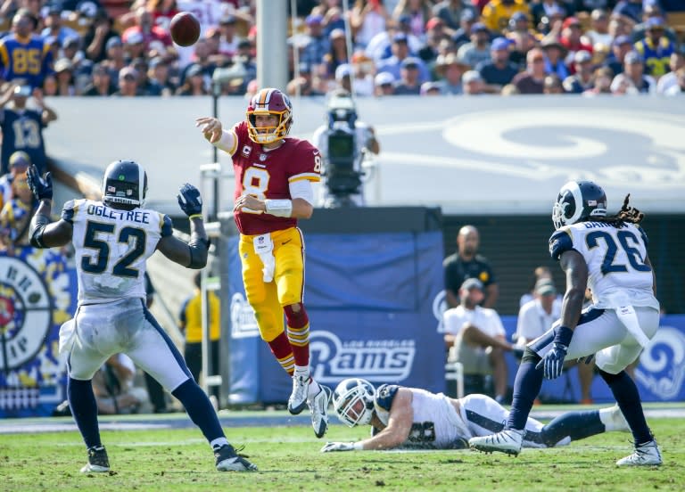 Kirk Cousins of the Washington Redskins throws the ball during the fourth quarter against the Los Angeles Rams, at Los Angeles Memorial Coliseum in California, on September 17, 2017