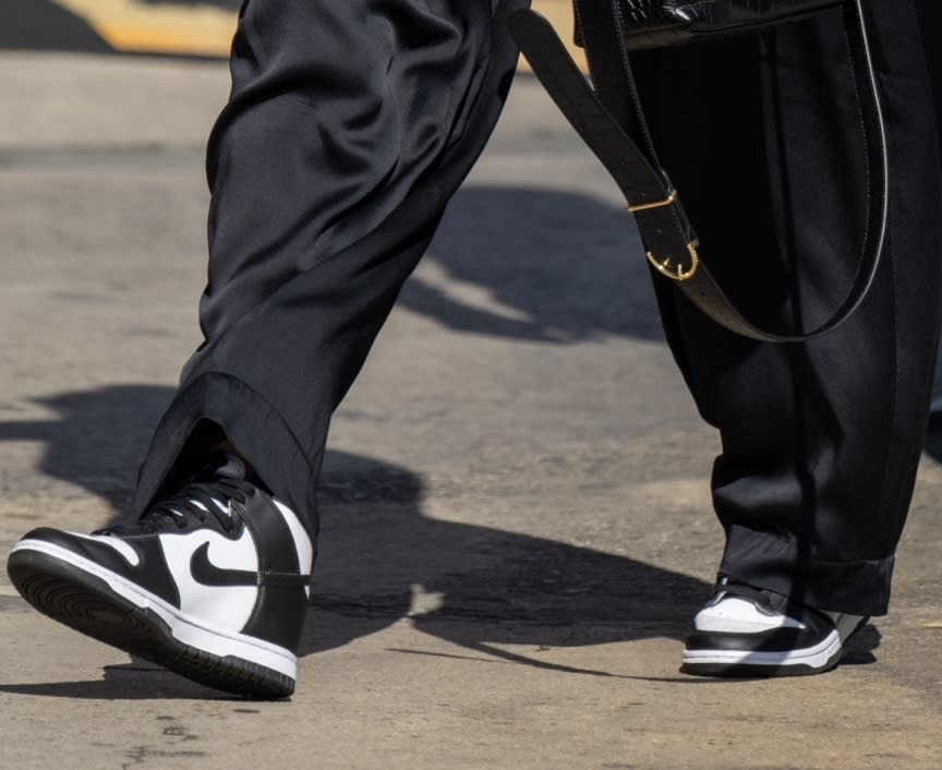 A closer look at the Nike Dunk High Tops in black and white worn by Emily Blunt ahead of "Jimmy Kimmel Live."