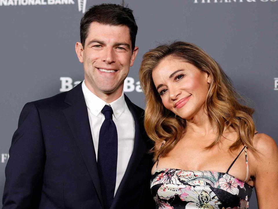 <p>Amy Sussman/Getty</p> Max Greenfield and Tess Sanchez at the Baby2Baby 10-Year Gala in 2021 in Hollywood, California.