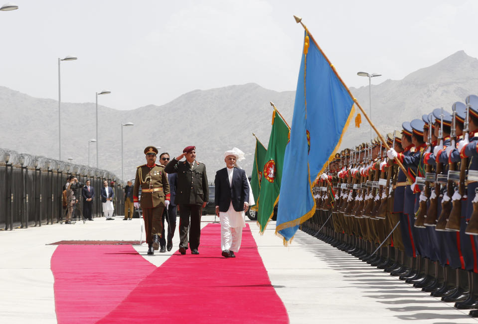 Afghan President Ashraf Ghani arrives for inauguration of the country's new parliament in Kabul, Afghanistan, Friday, April 26, 2019. Ghani has inaugurated the country's new parliament after almost six months since elections were held and following long delays, claims of voter fraud, unresolved disputes and political bickering. (AP Photo)