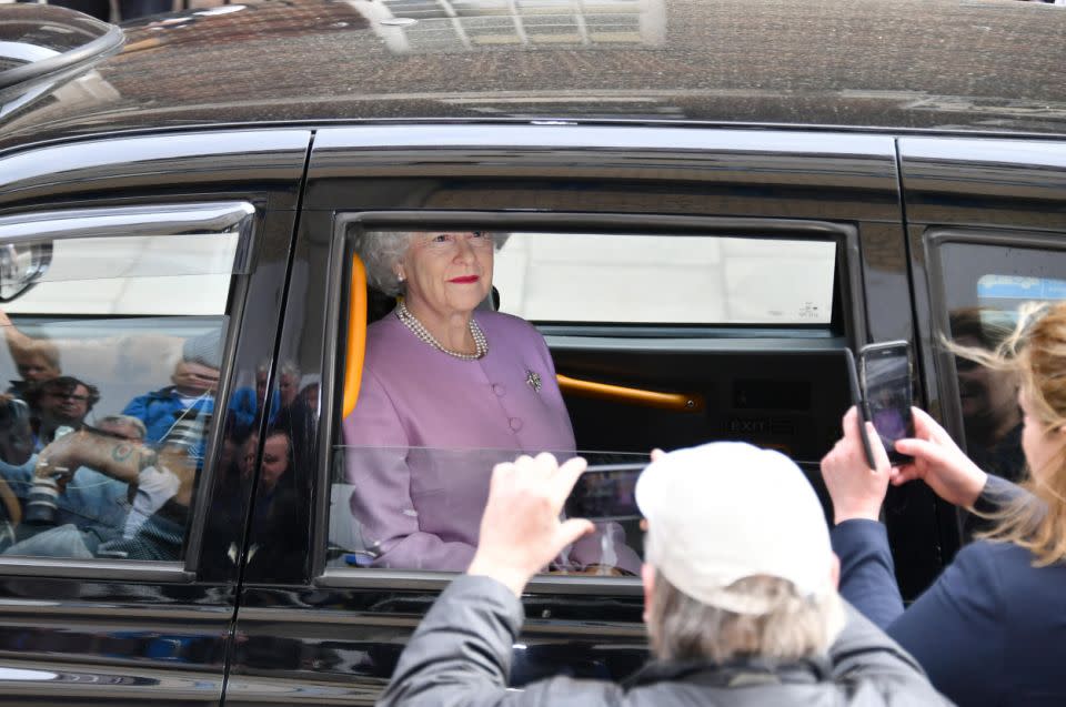 Fans rushed to get a photo of who was inside. Photo: Getty