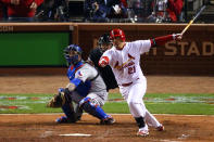 ST LOUIS, MO - OCTOBER 20: Allen Craig #21 of the St. Louis Cardinals hits an RBI single in the seventh inning off of Alexi Ogando #41 of the Texas Rangers during Game Two of the MLB World Series at Busch Stadium on October 20, 2011 in St Louis, Missouri. (Photo by Dilip Vishwanat/Getty Images)