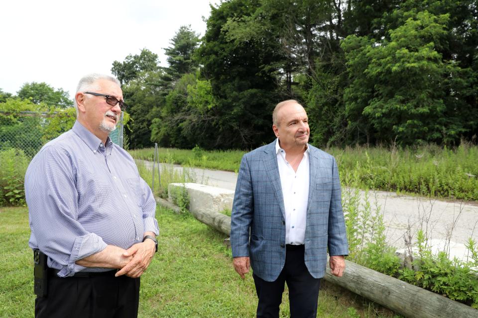 Mount Pleasant Town Supervisor Carl Fulgenzi, left, and developer John Fareri discuss the North 80 biotech center project at the site in Valhalla, July 13, 2023. The biotech campus will include medical offices, restaurants, a hotel and a STEM education center. 