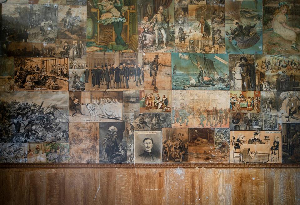 A wall of political cartoons from 1885 in Kilberry Castle.