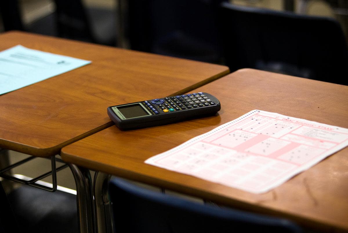 A calculator and a test sheet on a desk at Elsik High School in 2018.
