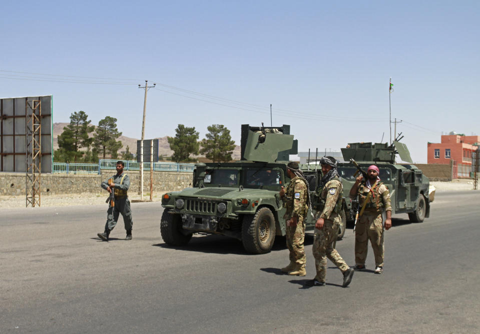 Afghan security personnel patrol after they took back control of parts of the city of Herat following fighting between Taliban and Afghan security forces, on the outskirts of Herat, 640 kilometers (397 miles) west of Kabul, Afghanistan, Sunday, Aug. 8, 2021. (AP Photo/Hamed Sarfarazi)