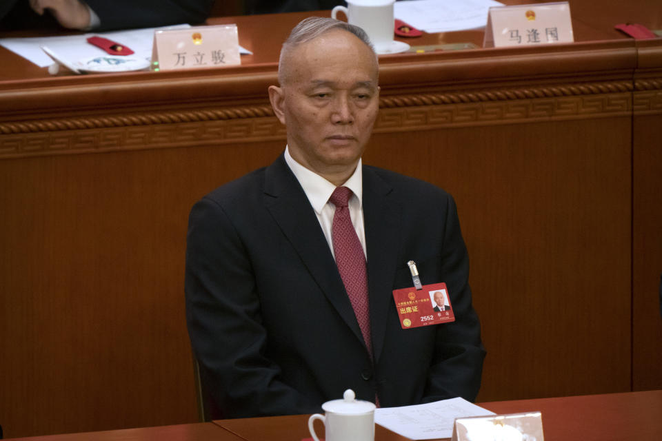 Cai Qi attends a session of China's National People's Congress (NPC) at the Great Hall of the People in Beijing, Friday, March 10, 2023. Six men sit alongside Chinese leader Xi Jinping on the ruling Communist Party's all-powerful Politburo Standing Committee, handling major portfolios from propaganda to corruption fighting. (AP Photo/Mark Schiefelbein)