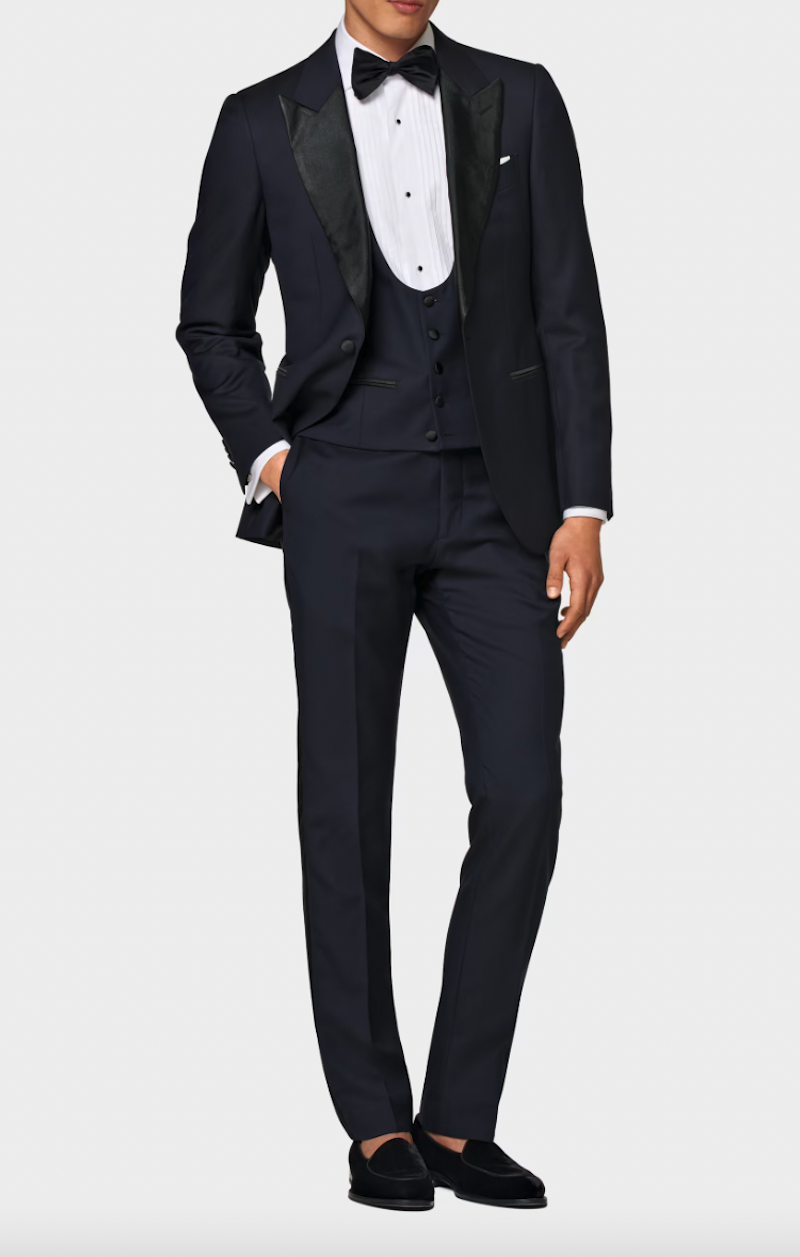 <p><a href="https://go.redirectingat.com?id=74968X1596630&url=https%3A%2F%2Fsuitsupply.com%2Fen-us%2Fmen%2Fsuits%2F-navy-three-piece-tailored-fit-lazio-tuxedo%2FC7353-S2.html&sref=https%3A%2F%2Fwww.esquire.com%2Fstyle%2Fmens-fashion%2Fg19851288%2Fwedding-dress-code-guide-men%2F" rel="nofollow noopener" target="_blank" data-ylk="slk:Shop Now;elm:context_link;itc:0;sec:content-canvas" class="link ">Shop Now</a></p><p>Navy Three-Piece Tailored Fit Lazio Tuxedo</p><p>suitsupply.com</p><p>$927.00</p>