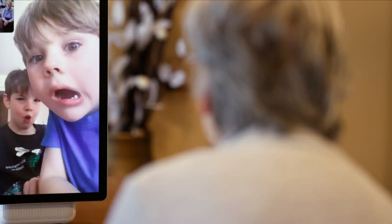 Resident Tolson chats via Facebook Portal to her grandchildren at the Foxholes Care Home