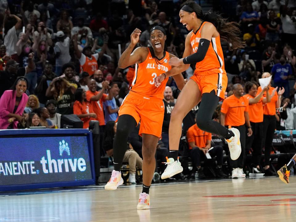 Jul 10, 2022; Chicago, Ill, USA; Team Wilson forward Sylvia Fowles (34) celebrates her dunk with forward A’ja Wilson (22) during the first half of the WNBA All Star Game at Wintrust Arena.