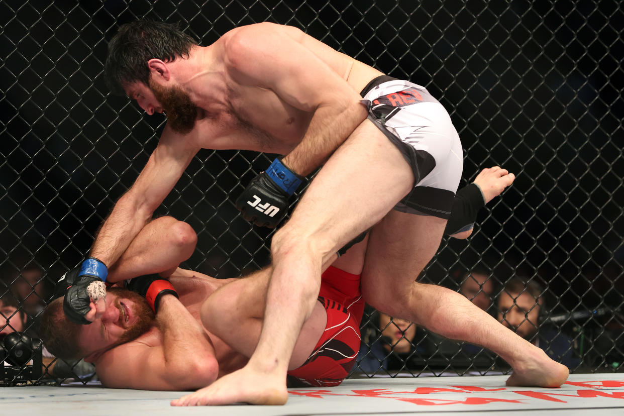 LAS VEGAS, NEVADA - DECEMBER 10: (R-L) Magomed Ankalaev of Russia punches Jan Blachowicz of Poland in their UFC light heavyweight championship fight during the UFC 282 event at T-Mobile Arena on December 10, 2022 in Las Vegas, Nevada. (Photo by Sean M. Haffey/Getty Images)