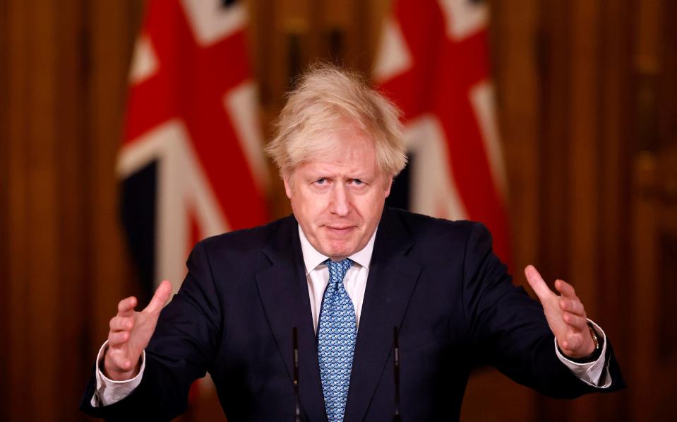 Britain's Prime Minister Boris Johnson speaks during a media briefing (AP)