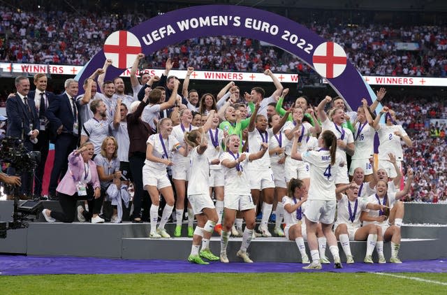 England players celebrate with the Euro 2022 trophy