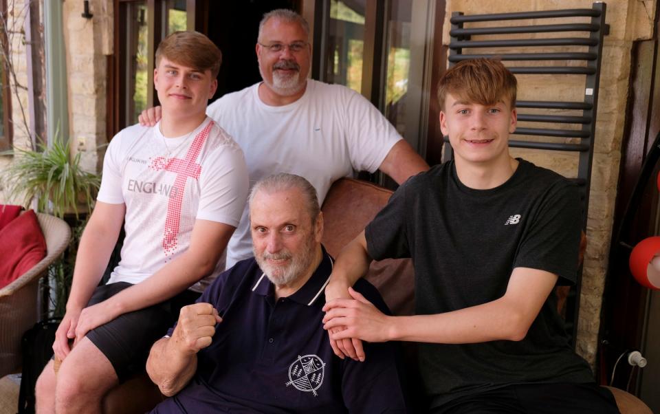 Geoff Capes photographed at home with son Lewis and grandsons Donovan and Lawson